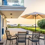Sandoa - Beachfront Lägenhet