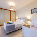 Sandoa - Beachfront Lägenhet