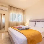 Sandoa - Beachfront Lägenhet