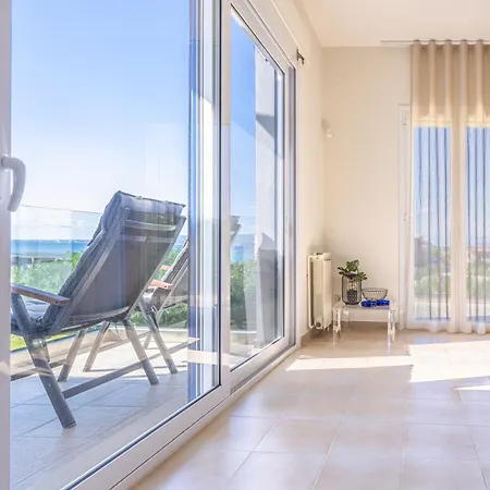 Sandoa - Beachfront Lejlighed *
